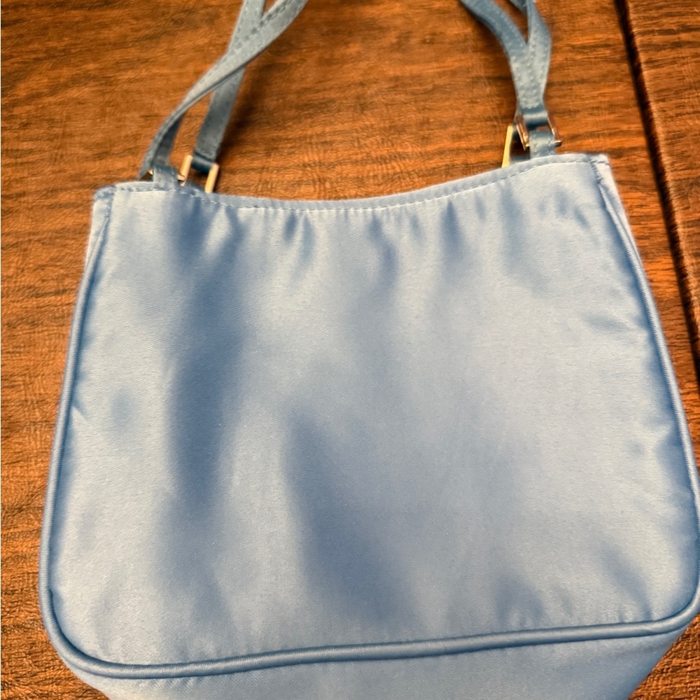 Henri Bendel Blue Mini Bag with Minimalist Design